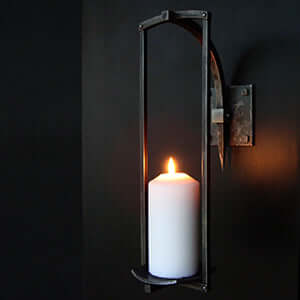 Wrought iron candle wall sconce
