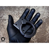 hand holding a wrought iron ring pull with square backplate made by gaaluub