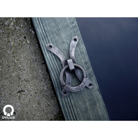 wrought iron ring pull on a wooden beam made by gaaluub